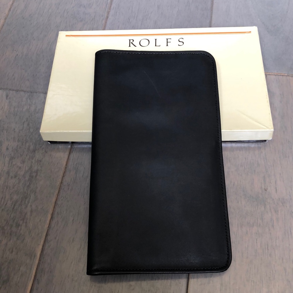 Vintage NIB Rolfs leather travel case.